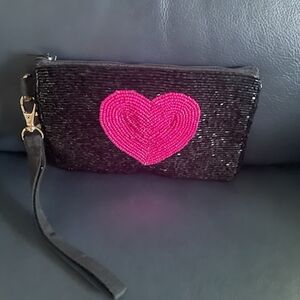 Chic Black Wristlet with Vibrant Pink Heart